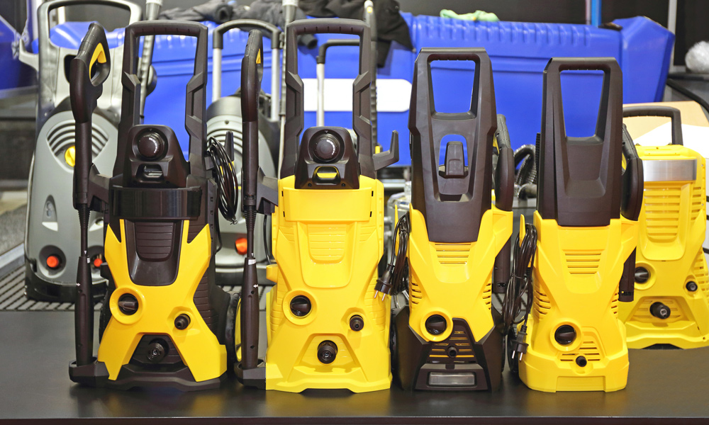 Four electric Karcher Pressure Washer in a row